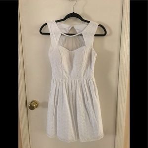 white sleeveless dress with sweetheart neckline